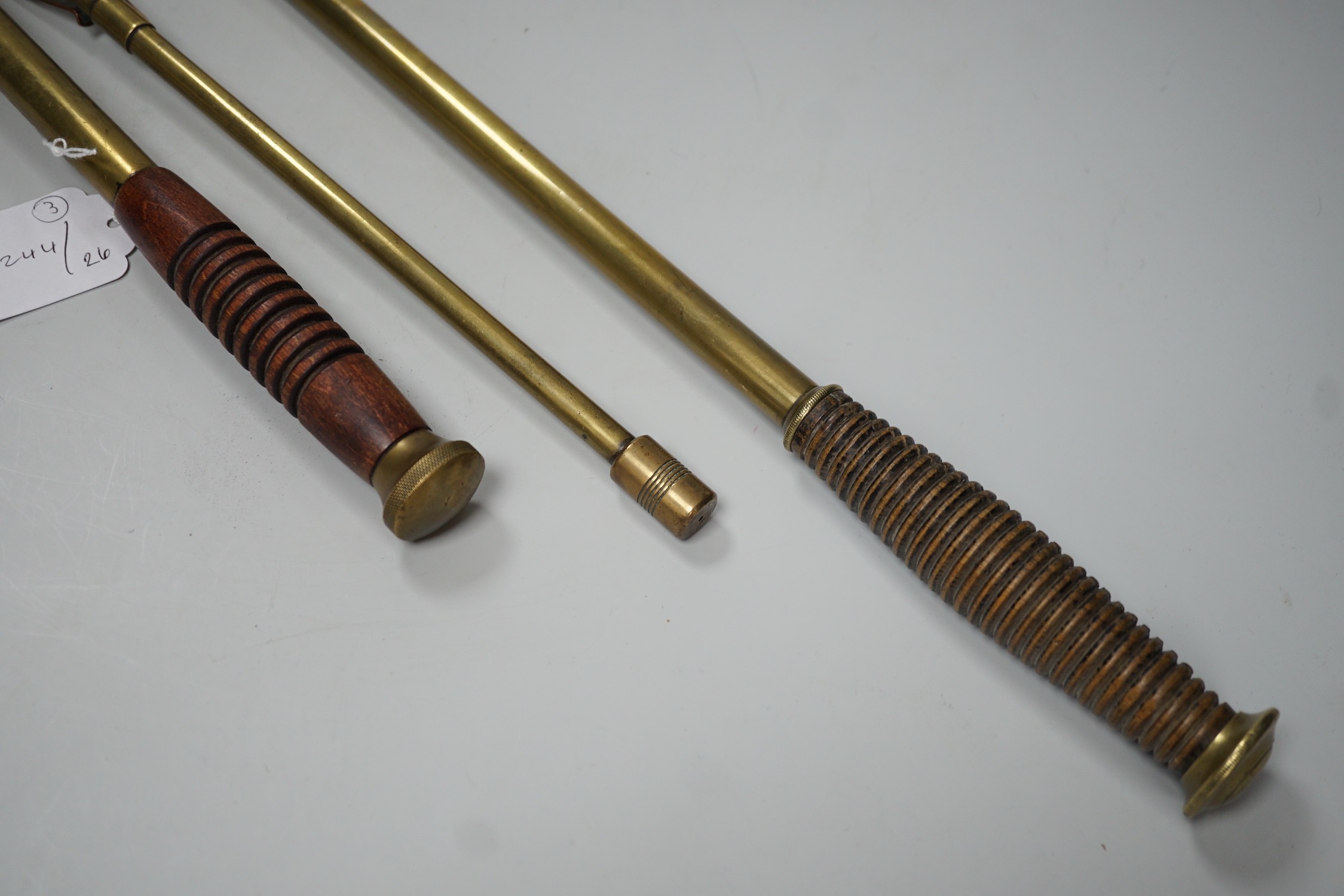 Three brass telescopic fishing gaffs